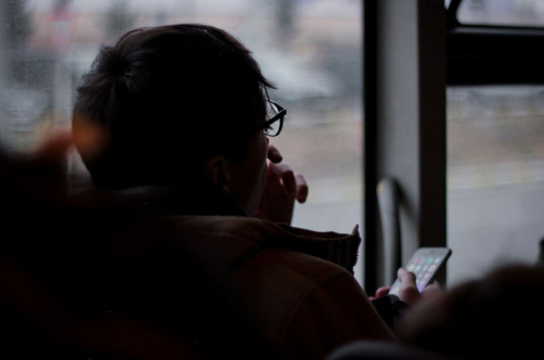 woman reading on bus
